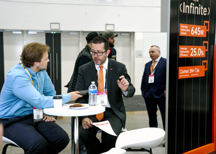 PV Tech's George Heynes (left) interviewed Aiko Solar's Thomas Bywater (right) at All-Energy Australia 2024. Image: Aiko Solar.