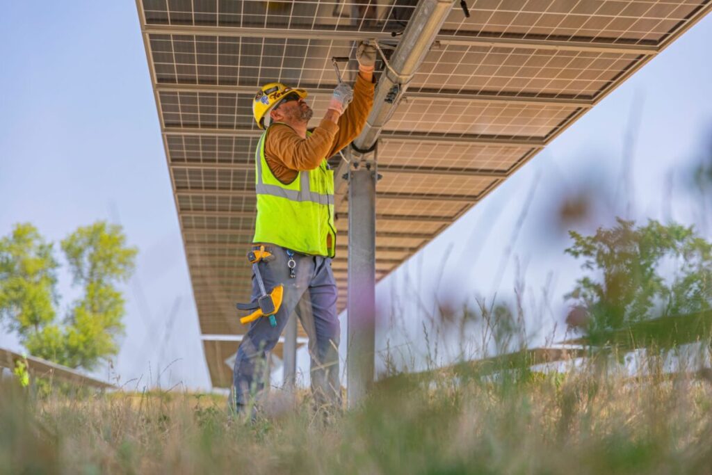 Worker on an utility-scale solar project